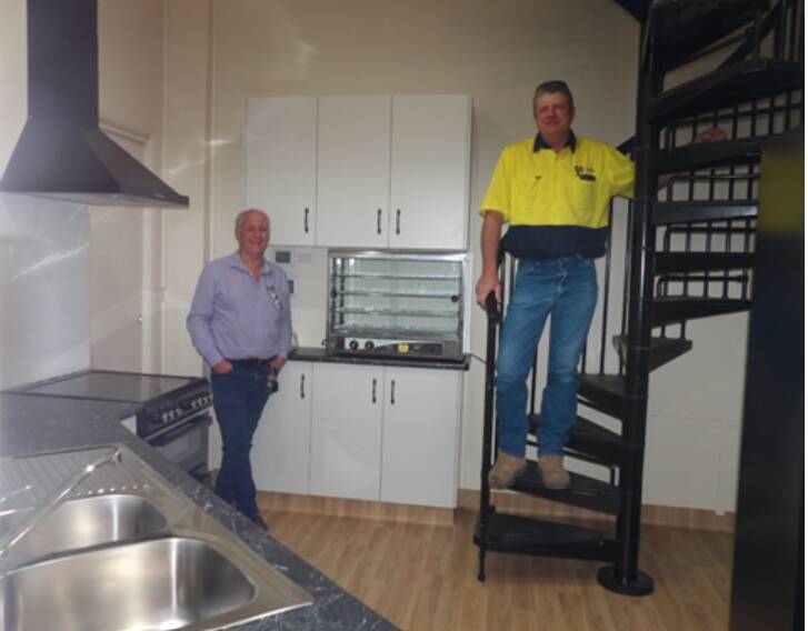 Mayor Andrew Hope and local builder Tim Hoswell, the contractor for the project, inspecting the completed kitchenette and staircase at Quirindis Royal Theatre. Photo: Supplied