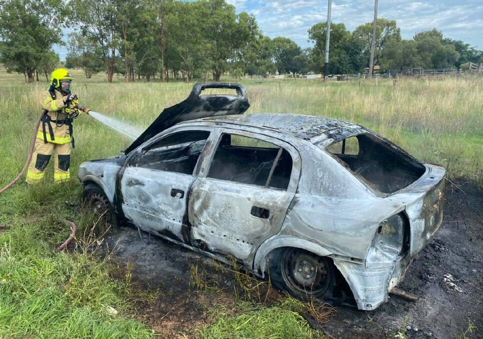TORCHED: Fire crews and police are currently on scene at Cole Road where a car has been set alight. Photo: NSW Fire and Rescue Station 448 South Tamworth