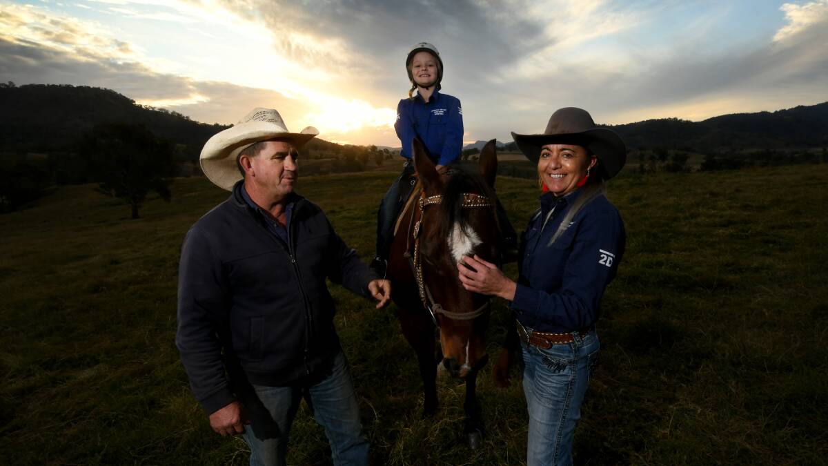 SADDLE UP: Jason Newman, Piper Hammer on Squirrel with Christine Ogilvie from Tamworth and Kootingal Horse Riding Adventures are ready to get back in the saddle, they just have to find out where to go to get permission to open. Photo: Gareth Gardner