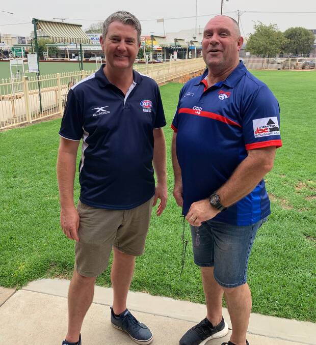 THINKING AHEAD: AFL North West community development officer Paul Taylor and Bulldogs coach Doug Meagher after Sunday's meeting. 