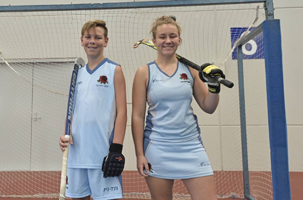 STICK IT TO EM': Tamworth's Ella Mitchell and Mitchell Scott will represent NSW at the indoor hockey national championships. Photo: Billy Jupp 