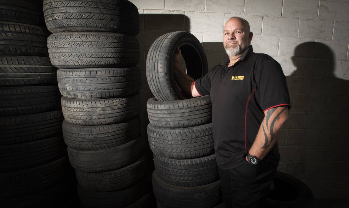 SECOND LIFE: Jax Tyres store manager Jason Hicks is urging locals to bring in their used tyres to ensure they are disposed of correctly. Photo: Peter Hardin 101120PHB003