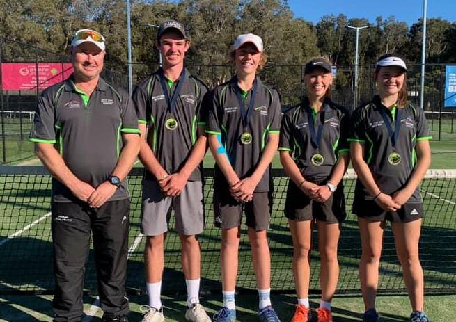 WINNERS: Jarrod Campbell, Zachery Adams, Ben Butler, Anna Bishop and Lucy Gainsford celebrate the North West's recent Wendy Saville Cup victory. Photo: Supplied 