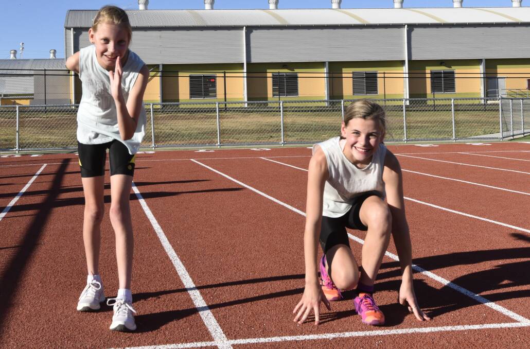 TOP EFFORT: Abbie Peet and Isabella Wall enjoyed success at the state athletics championships claiming silver medals as well as personal best times. Photo: Billy Jupp