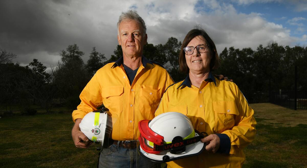 GIVING BACK: Last summer's bushfire crisis compelled Harland and Sue Lisle to volunteer for the Kingswood RFS brigade. Photo: Gareth Gardner