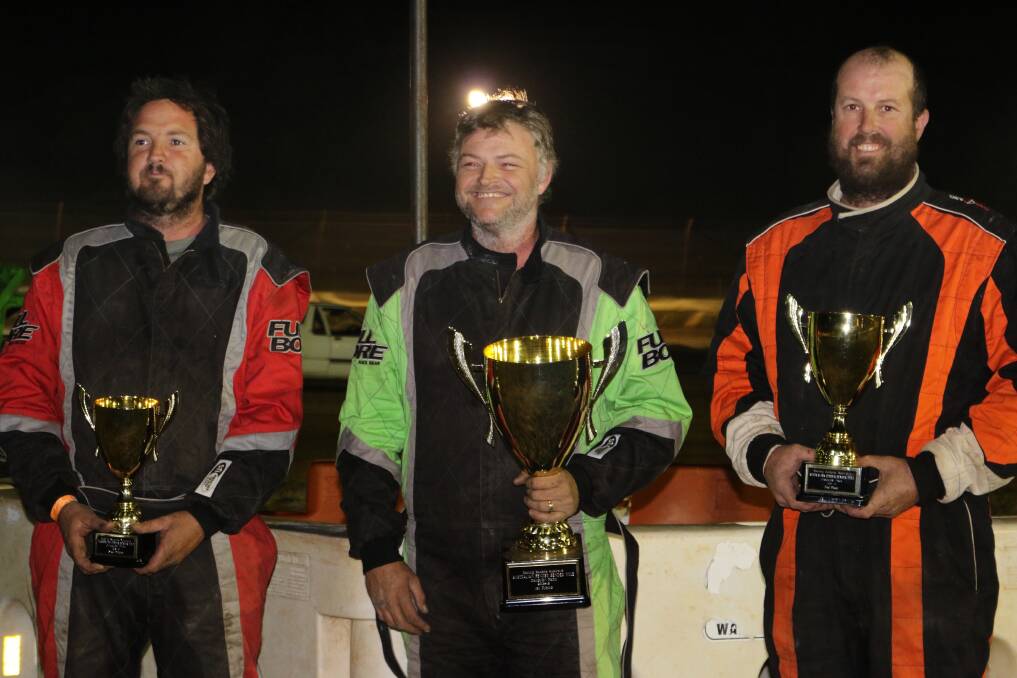 PODIUM FINISH: Third-placed Simon Hood, first-placed Scott Riley and second-placed Michael Broom celebrate their success at Oakburn Park. Photo: Dirt Track Angel Photography 
