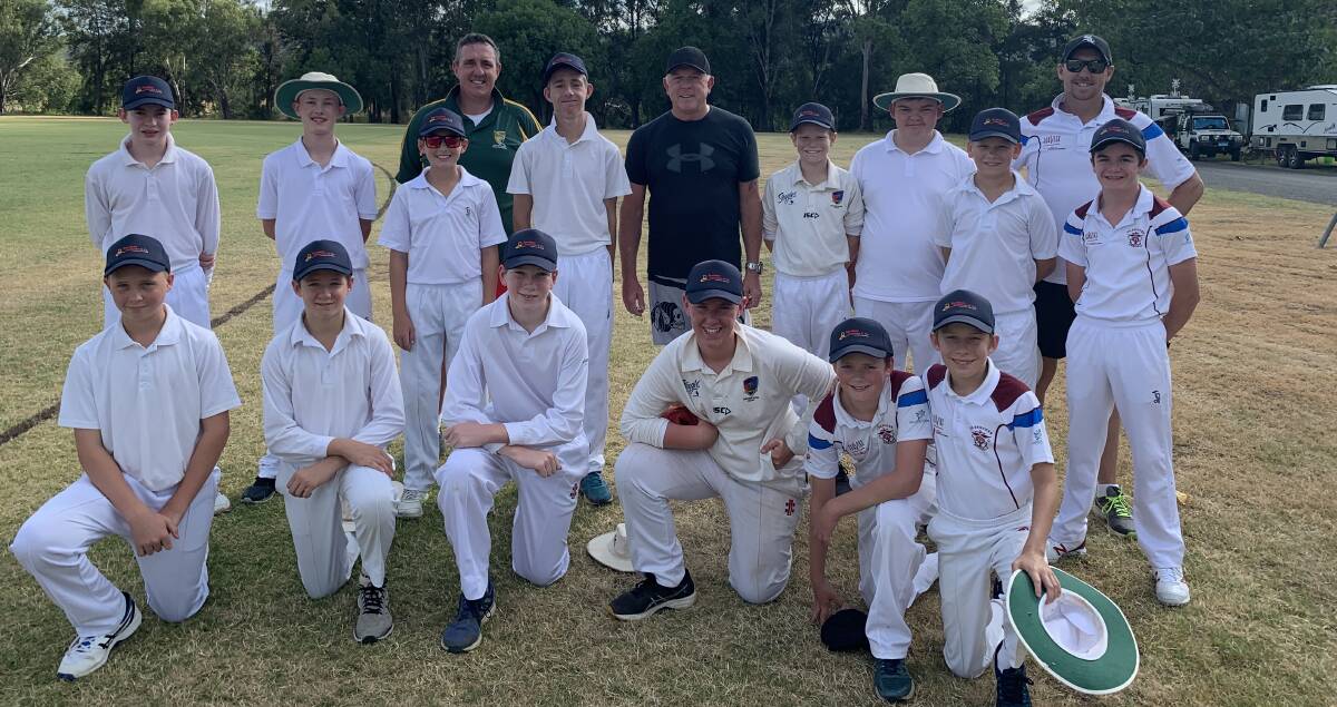 BRUSH WITH GREATNESS: The Invitational side was handed their caps by former Australian fast bowler Craig McDermott before the start of play. Photo: Supplied 