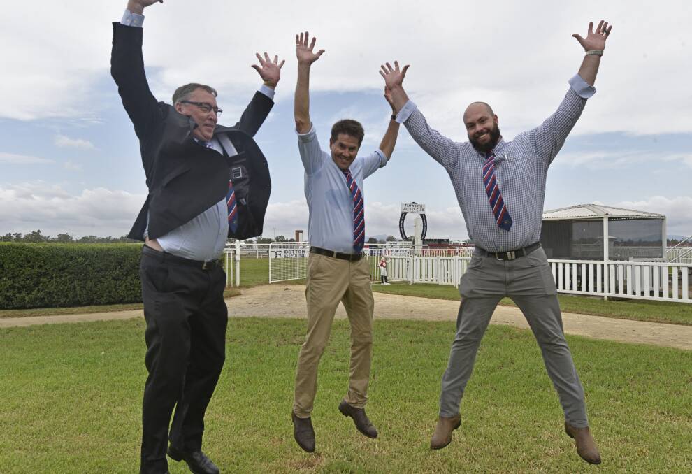 JUMP FOR JOY: Greg Birtles, Kevin Anderson and Mitch Shaw welcome the news of the Tamworth Jockey Club's $600,000 sand track upgrade. Photo: Billy Jupp 