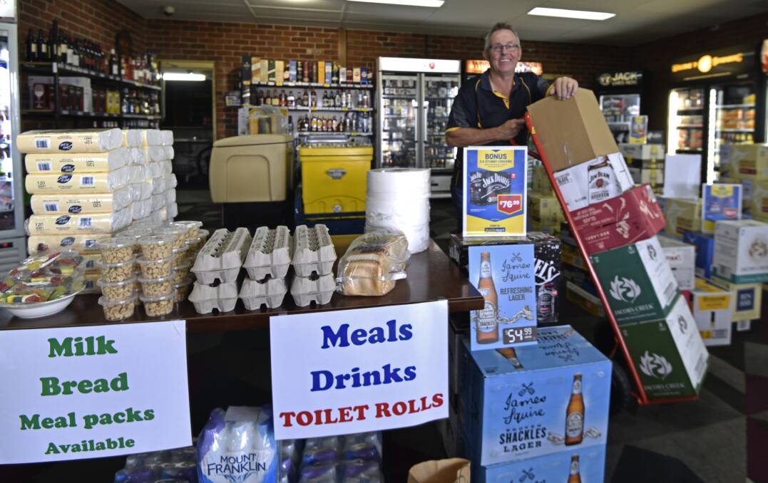 ONE-STOP SHOP: The Pub Group's Trevor Dodd has been busy helping locals stock up for the Easter long-weekend. Photo: Billy Jupp 