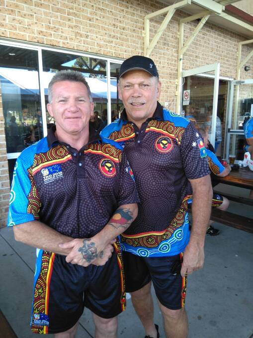 TEAMMATES: Gunnedah's Darren Barton and NRL great Cliff Lyons lined up for the Australian Indigenous Oztag over 50s mens side. Photo: Supplied
