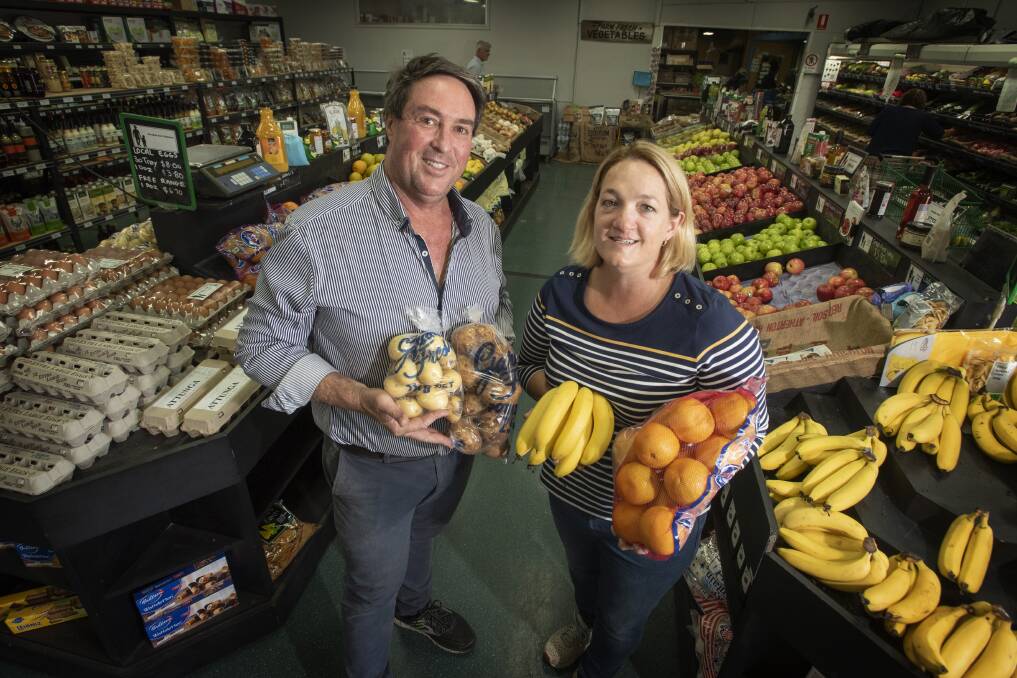 KEEPING UP: Farmer Bob's owners Brendon and Vicki North have been kept busy by the high demand for fresh produce. Photo: Peter Hardin 180320PHF004 