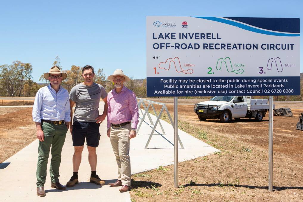 EXCITING: Northern Tablelands MP Adam Marshall, Inverell Cycling Club president Andrew Blake and Inverell mayor Paul Harmon inspect the new off-road track. Photo: Supplied 