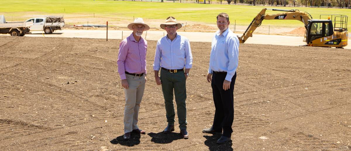 HOME STRETCH: Inverell mayor Paul Harman, Northern Tablelands MP Adam Marshall, and Inverell Shire Councils civil engineering manager Justin Pay inspect progress on the new athletics precinct. Photo: Supplied 