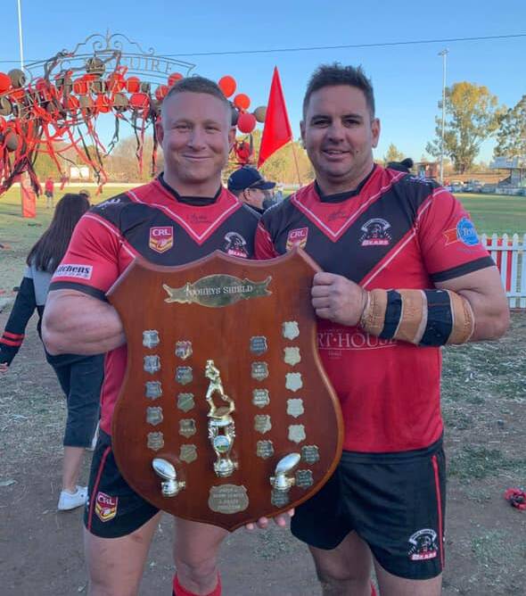 WINNING FEELING: Jeremy York and Andrew Moodie celebrate the North Tamworth Bears' premiership victory over the Kootingal-Moonbi Roosters on Saturday. Photo: Supplied 