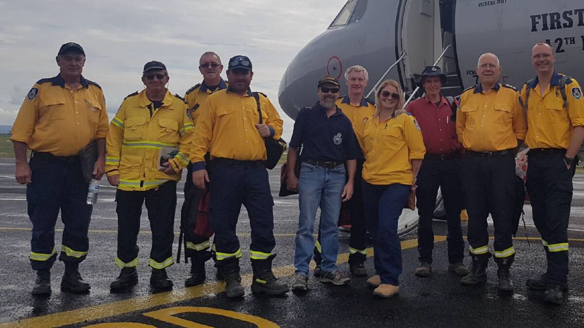 COMMUNITY SPIRIT: Members of the New England RFS endured a busy summer fighting fires right across the state. Photo: Supplied 