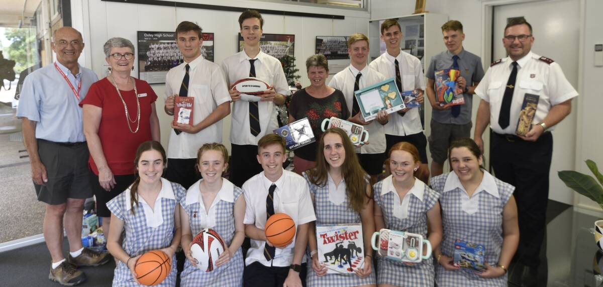 HELPING HAND: Students from Oxley High School have been supporting the Uniting Church and Salvation Army's Christmas appeal with a wishing tree. Photo: Billy Jupp 