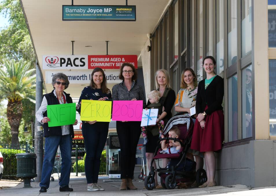STRONG MESSAGE: Tamworth Parents and Friends for Climate Action members Rosemary Milson, Helen Cameron, Penny Milson, Tessa Rainbird, Harriet Watkins 1, Eliza Weekes, Arthur Weekes 10 Months and Alice Milson delivered the petition to Barnaby Joyce's office. Photo: Gareth Gardner 061120GGB01