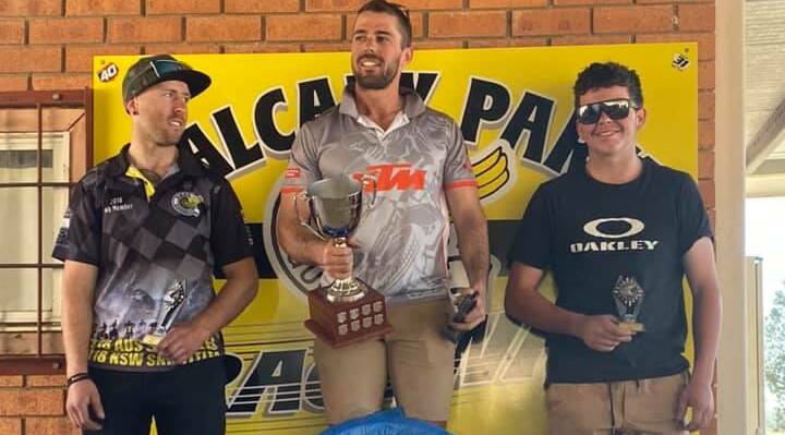 PODIUM FINISH: Jordan Dall (second), Jarryd Oram (first) and Tom Donnelly (third) celebrate their success after the Goodwin Kenny Cup Pro 450 event. Photo: Supplied 