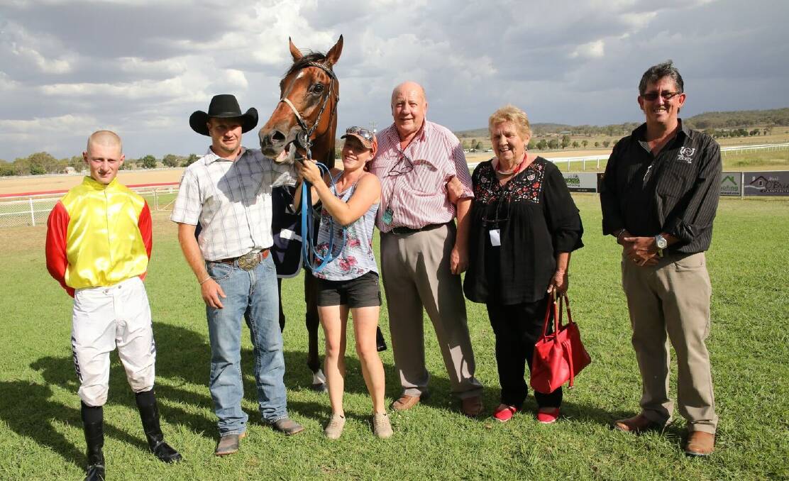ON SONG: Trainer Troy O'Neile, second left, will be looking to continue his recent run of good form, at Tamworth Racecourse on Friday. Photo: Bradley Photographers