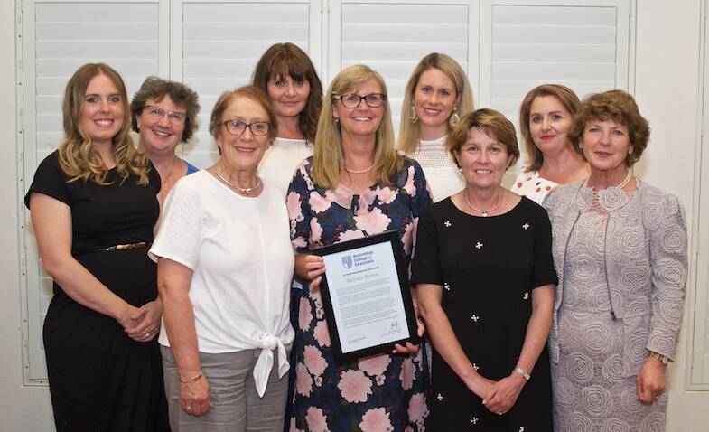 BEST IN CLASS: Mrs Belinda Burton (centre) with friends and colleagues at the Australian College of Educators (ACE) awards. Photo courtesy of Dave Robinson Photography