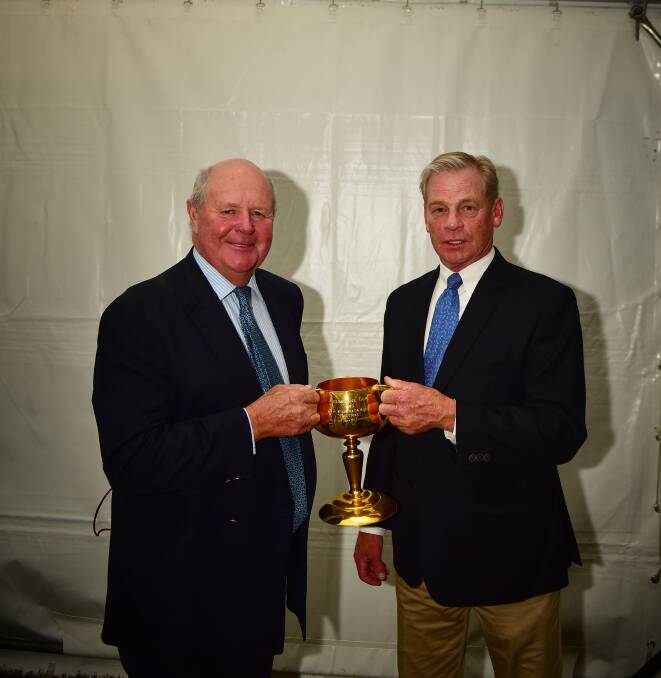 FAMILY LEGACY: Cousins Henry and Tim Moses at the Moree dinner to kick off the 2020 Melbourne Cup tour with the 1920 Melbourne Cup, which was won by Poitrel, owned by Henry's grandfather (Tim's great grand father) and his brother. Photo: Amy Burling Photographer