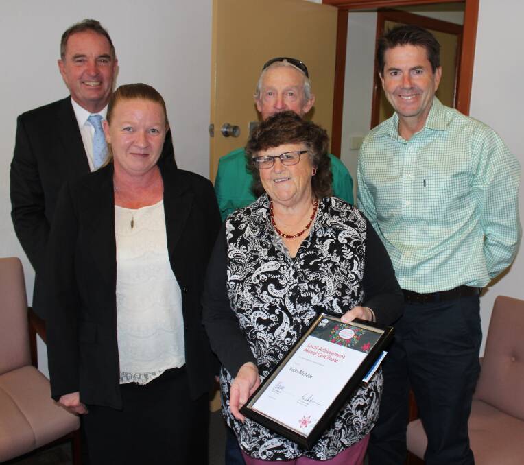 LOCAL HERO: Member for Tamworth Kevin Anderson MP with Walcha Council Mayor, Cr Eric Noakes, Walcha Ex Services Clubs Leanne Presnell who nominated Vicki for her award, Vicki McIvor and her husband Peter.