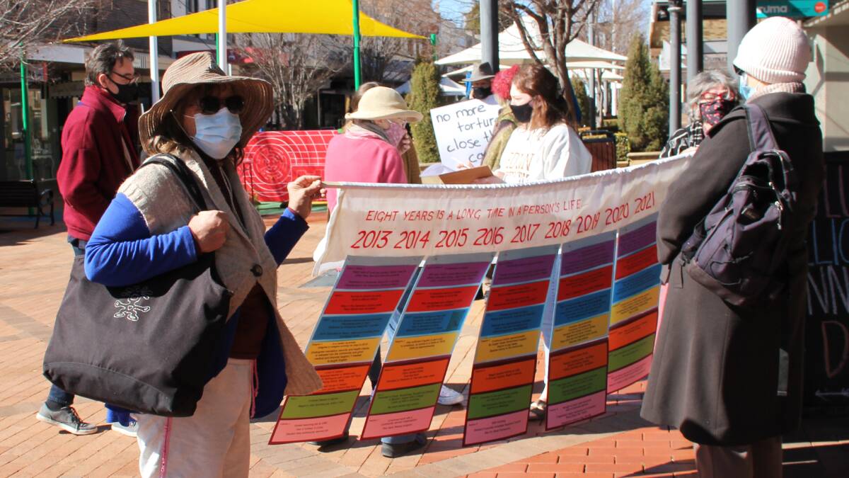 Members of Rural Australians for Refugees gather in Beardy Street Mall in Armidale on Monday