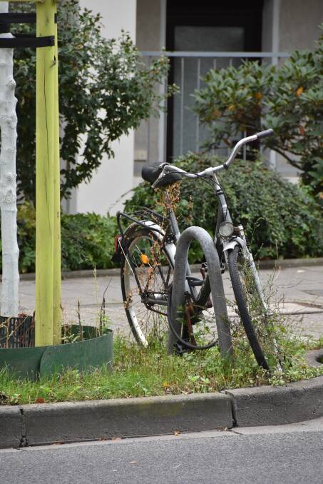 STILL: Bikes that have come to the end of both their physical and life journey can be seen to be in "retirement", often still chained up. 