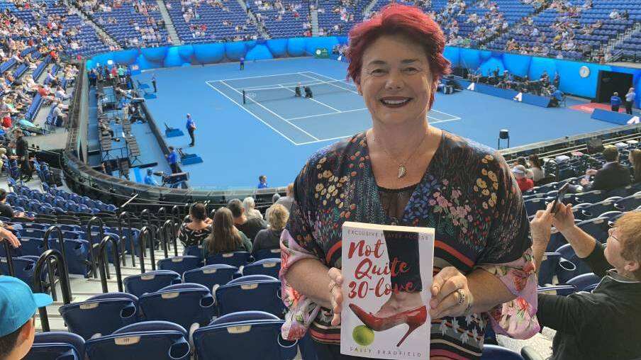 Sally Bradfield at the Australian Open with her newly-released Not Quite 30-Love, about life on the professional tennis circuit.