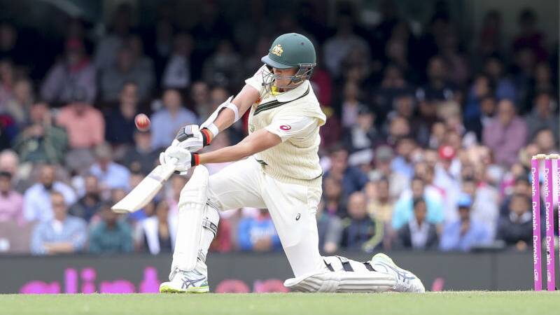Josh Hazelwood wields the willow in the fourth Test against India at the SCG.