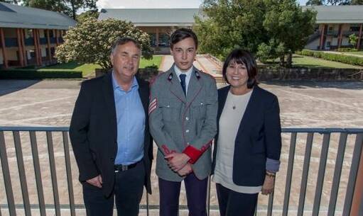 Stuart Kelly with his parents Ralph and Kathy. Photo: The King's School
