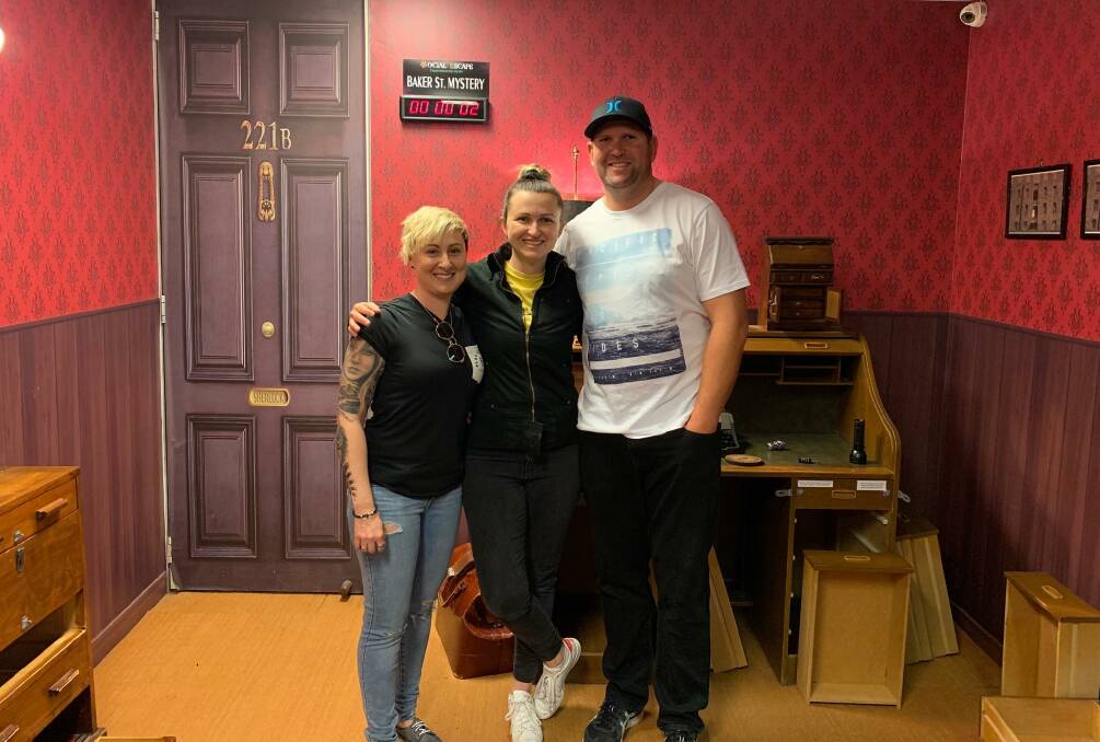 DOORS TO OPEN: Jody and Stuart Stevens, right, in a Sydney escape room with friend Rebecca Thompson. The Stuarts will be opening their own such venue in Tamworth in the coming weeks.