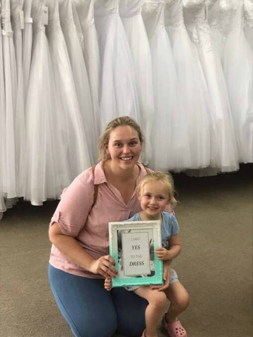 YES TO THE DRESS: Larina Zell and daughter Lilly Chester, whose hard work and determination has warmed hearts across the community.