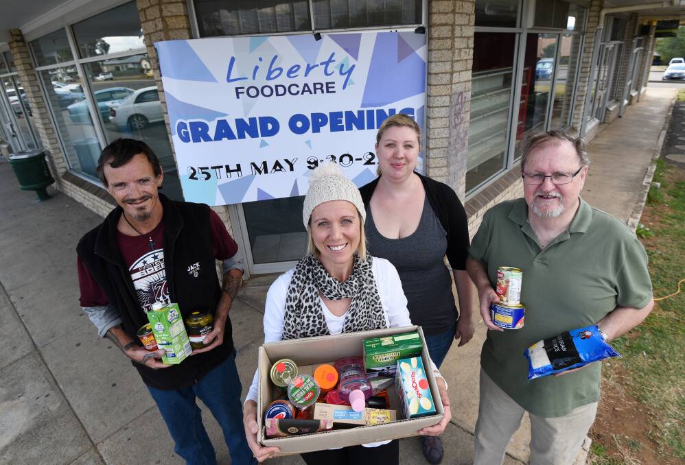 OPENING SOON: Paul Bannister, Cass McIlrick, Alex Bulcock and David King show off some of the items available at Liberty Foodcare. Photo: Gareth Gardner 180517GGD01