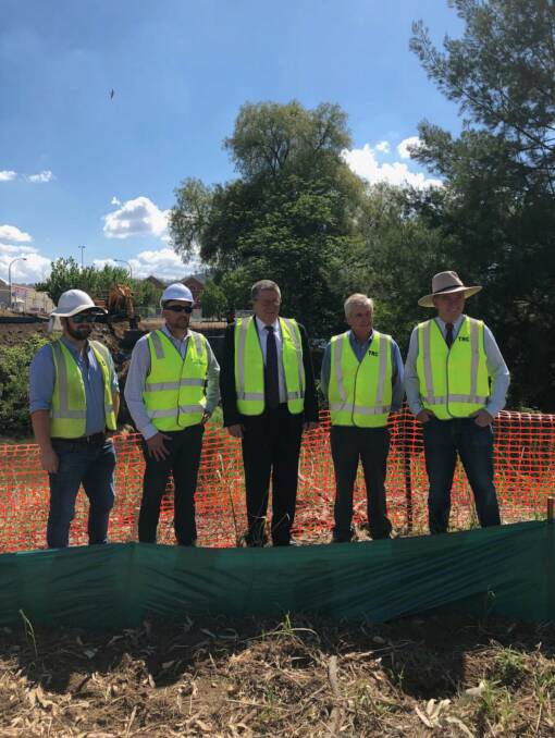 Barnaby Joyce, Col Murray, deputy mayor Phil Betts and contractors on-site.