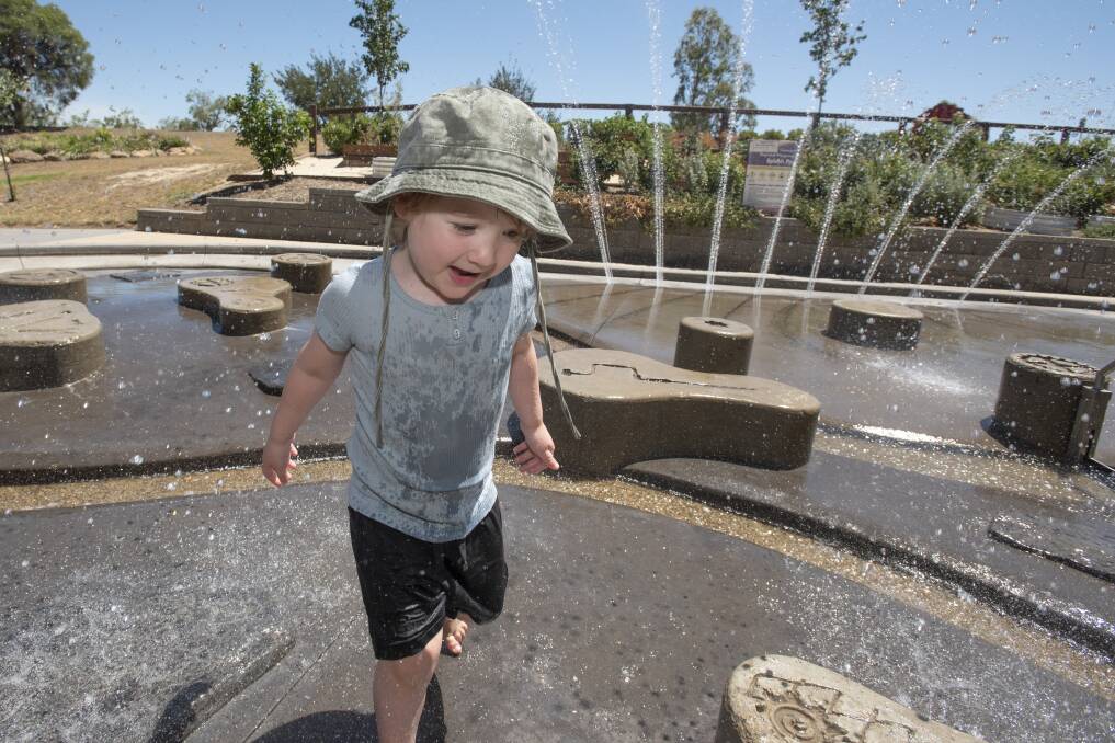 COOLING DOWN: Jasper Wann, 3, beat the heat yesterday with some fun at the Tamworth Regional Playground splash pad - and temperatures could be record-breaking by the end of the week. Photo: Peter Hardin 161219PHE026
