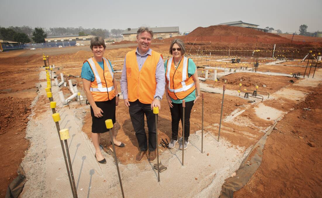 BREAKING NEW GROUND: School foundation chairwoman Karen Madirazza, principal David Smith and Old Girl Jacque Fogarty on the site late last year. Photo: Peter Hardin 191219PHA005