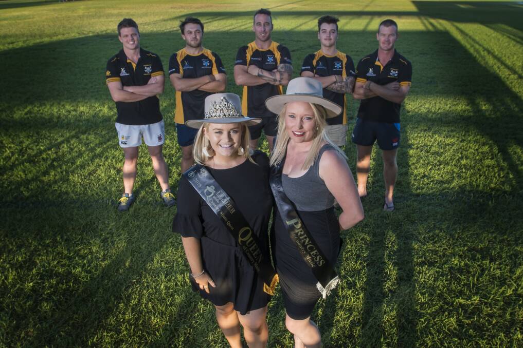 CAUSE: The Queen and Princess of Country Music, Alexandra Kellahan and Cheyanne Conlon - pictured with players James Trappel, Tim Collins, Jackson Sharpe, Matt Cannon and Jack Shelton - will be among those putting their efforts into raising money for motor nerone disease research and local support on Saturday. Photo: Peter Hardin 120418PHC007