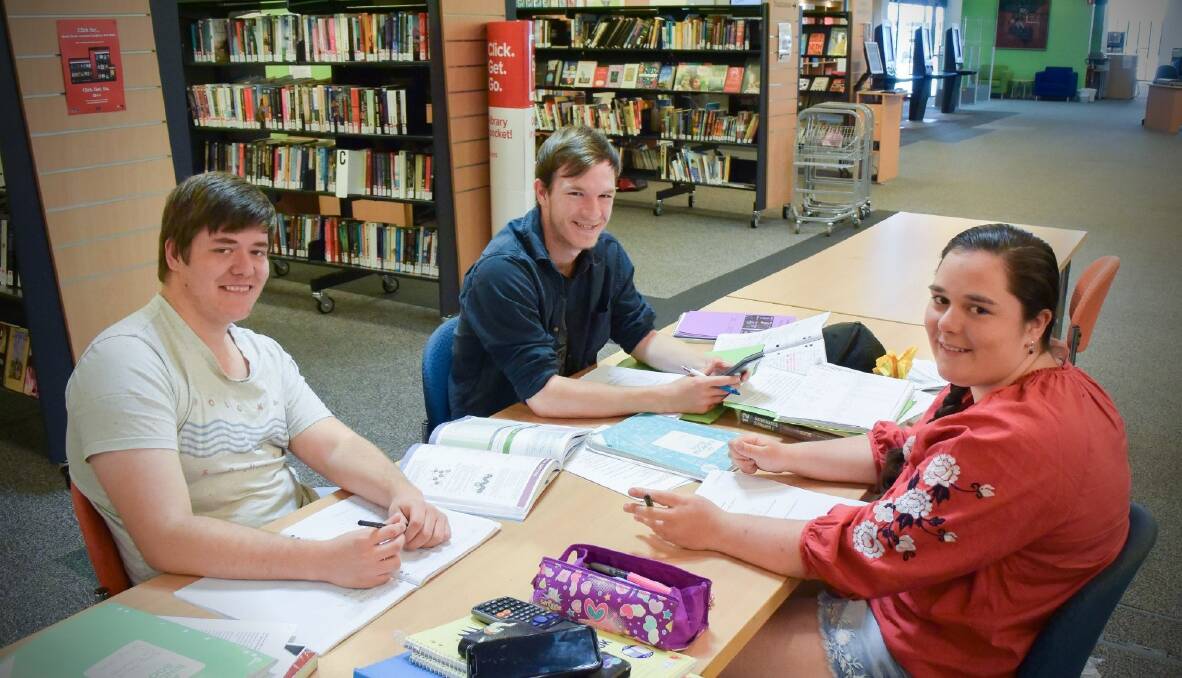 STUDY TEAM: Brody Edmonds, Jaxson Styles and Dharia Freeman spent some of their study hours in Tamworth City Library. Photo: Carolyn Millet 011019CMB01