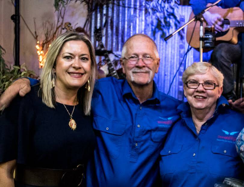 Here to help: Drought Angels' Dean and Chris Barnett at the Nundle Rainmakers Community Dinner, with event co-ordinator Teree Burr. Photo: Megan Trousdale