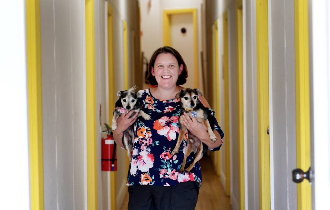 Rex Guesthouse owner Jody Ekert with her dogs Emma and Butch. Photo: Gareth Gardner 070518GGB001