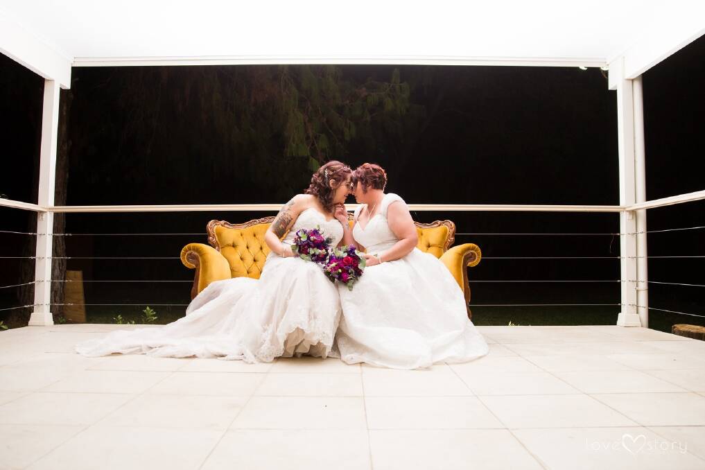 Courtney Mann and Shirley Kirk - now Mrs and Mrs Kirkmann - both wore white dresses. Photo: Love Story Photography