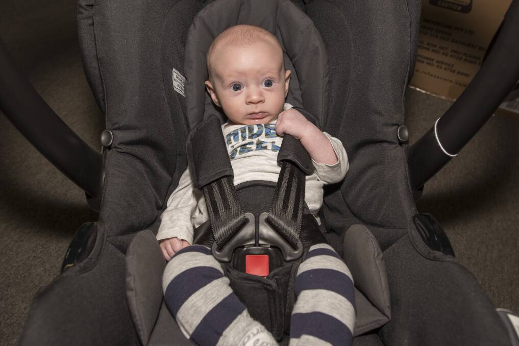 SAFE AND SOUND: Little Beau Turner knows the importance of a correctly installed child restraint, after he and his mum were in an accident last month - Deanna Sipple said he didn't even wake up. Photo: Peter Hardin 140519PHE015