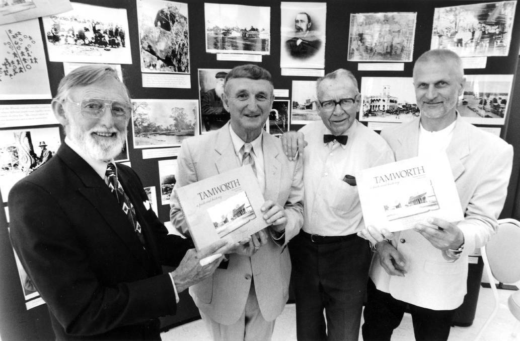 PROUD HISTORY: Historians Warren Newman and Lyall Green, at centre, at the launch of their pictorial history in 1998, flanked by publisher Alan Halbish and designer Richard Tabaka.