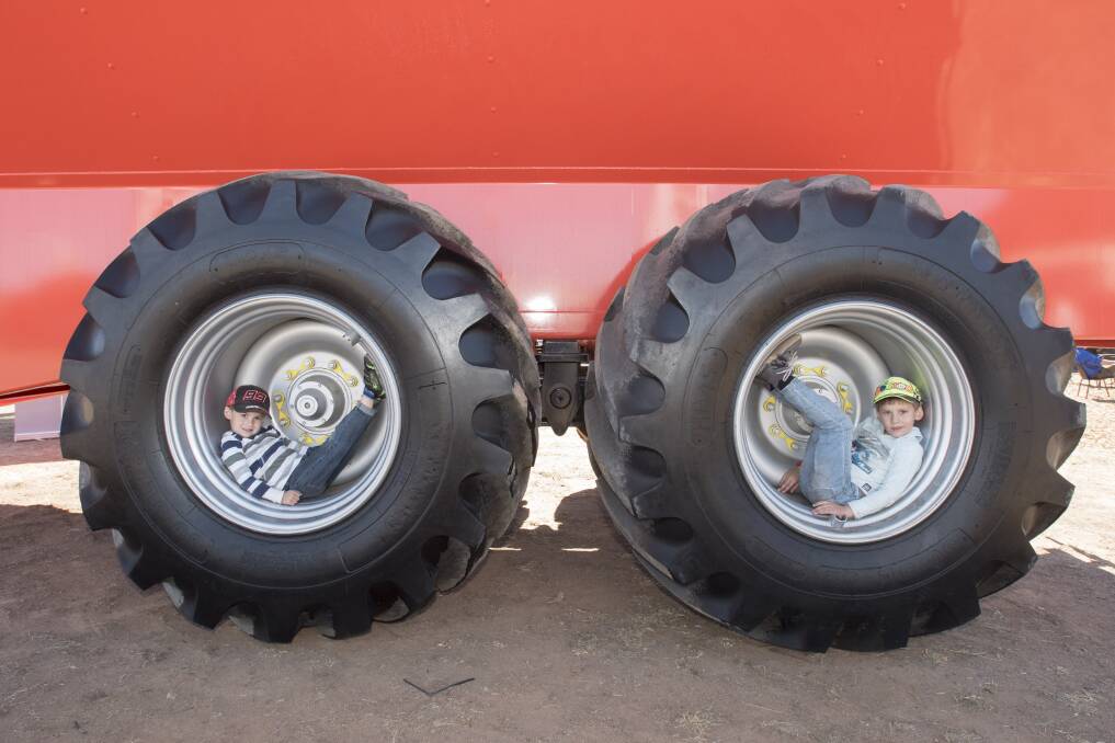There's something for everyone to enjoy at AgQuip, as Jacob and Joshua Sawley know. Photos: Peter Hardin 200819PHA245