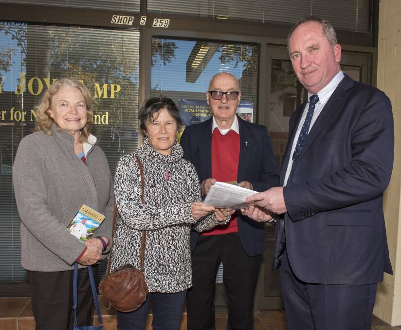 IN HAND: Lee Milroy, Maxine Ross and Father Ron Perrett hand their petition to New England MP Barnaby Joyce. Photo: Peter Hardin 210717PHD004