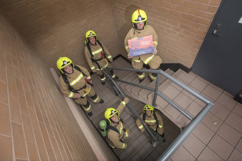 Tough climb: Colin Ferguson, Jason Lee, Bradley Clifford, Malachii Schofield and Nathan Fitzsimmons are gearing up for the Firies Climb for Motor Neurone Disease in November. Photo: Peter Hardin 010819PHC007