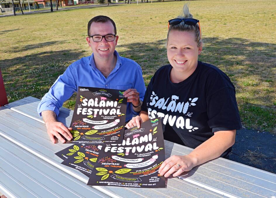 Northern Tablelands MP Adam Marshall and Ashford Salami Festival manager Pene Riggs talk over the program of activities.