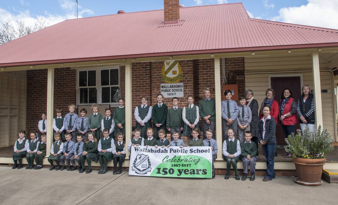 NOW: Most of the current staff and students of Wallabadah Public School, as it prepares to mark its 150th anniversary. Photo: Peter Hardin 140917PHD013