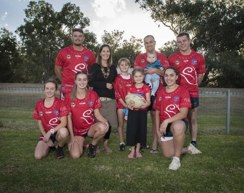 CLOSE TO HOME: Joanne, Lad, baby Jesse, Cooper and Ellie Jones, and the members and players of Kootingal Moonbi Rugby League Football Club, hope for a successful fundraiser. Photo: Peter Hardin 100518PHC032